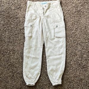 Brand new beige or cream colored cargo pants